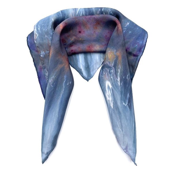 Blue, White, Purple and Orange multi-colored luxury silk bandana scarf in a diamond shibori pattern, sustainable wear with many style looks. Best fashion accessory for any season or occasion. Makes a great gift. Handmade one of a kind artisan accessories. Square shaped 21 inches by 21 inches.