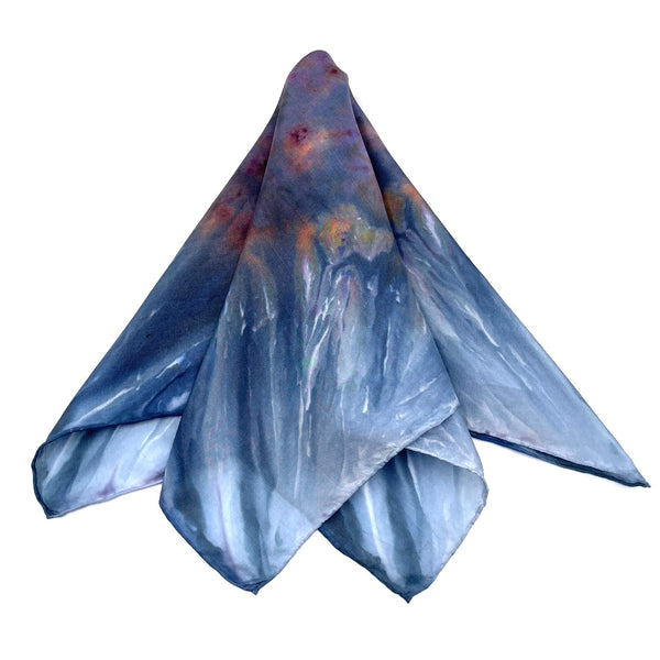 Blue, White, Purple and Orange multi-colored luxury silk bandana scarf in a diamond shibori pattern, sustainable wear with many style looks. Best fashion accessory for any season or occasion. Makes a great gift. Handmade one of a kind artisan accessories. Square shaped 21 inches by 21 inches.