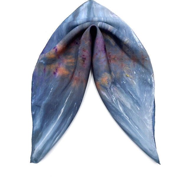 Blue, White, Purple and Orange multi-colored luxury silk bandana scarf in a diamond shibori pattern, sustainable wear with many style looks. Best fashion accessory for any season or occasion. Makes a great gift. Handmade one of a kind artisan accessories. Square shaped 21 inches by 21 inches.