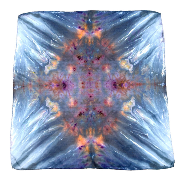 Blue, White, Purple and Orange multi-colored luxury silk bandana scarf in a diamond shibori pattern, sustainable wear with many style looks. Best fashion accessory for any season or occasion. Makes a great gift. Handmade one of a kind artisan accessories. Square shaped 21 inches by 21 inches.