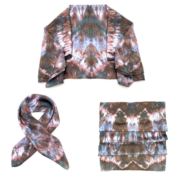 Red, green, blue and white luxury silk scarf bandana in tie dye shibori pattern, sustainable wear with many style looks. Best fashion accessory for any season or occasion. Makes a great gift. Handmade one of a kind artisan accessories. Square shaped 30 inches by 30 inches.