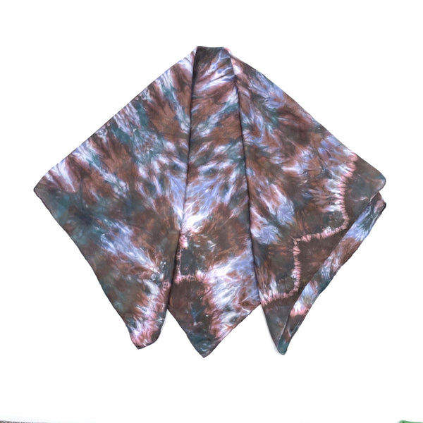 Red, green, blue and white luxury silk scarf bandana in tie dye shibori pattern, sustainable wear with many style looks. Best fashion accessory for any season or occasion. Makes a great gift. Handmade one of a kind artisan accessories. Square shaped 30 inches by 30 inches.