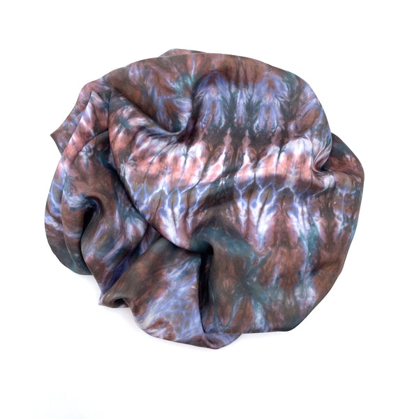 Red, green, blue and white luxury silk scarf bandana in tie dye shibori pattern, sustainable wear with many style looks. Best fashion accessory for any season or occasion. Makes a great gift. Handmade one of a kind artisan accessories. Square shaped 30 inches by 30 inches.