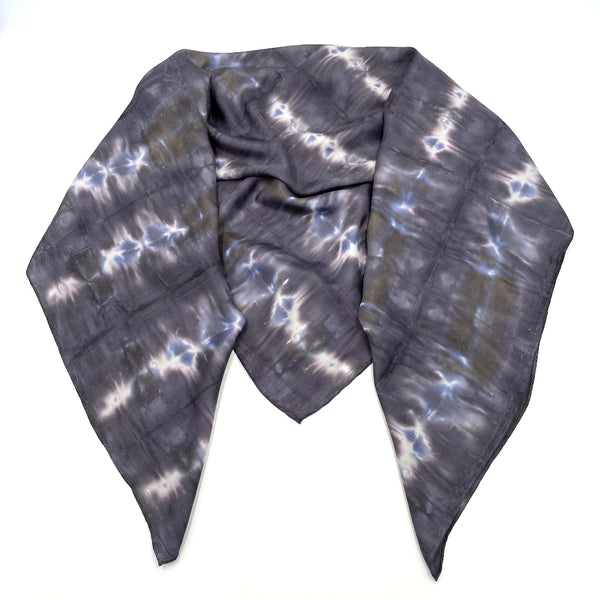 Black Charcoal and blue large luxury silk square scarf in striped shibori pattern, sustainable wear with many style looks. Best fashion accessory for any season or occasion. Makes a great gift. Handmade one of a kind artisan accessories. Square shaped 43 inches by 43 inches.