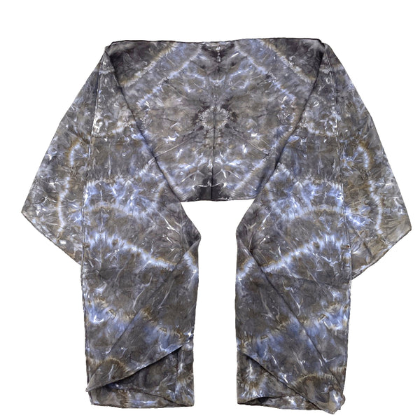 Charcoal blue luxury silk scarf in tie dye shibori pattern, sustainable wear with many style looks. Best fashion accessory for any season or occasion. Makes a great gift. Handmade one of a kind artisan accessories. Rectangle shaped 14 inches by 70 inches.