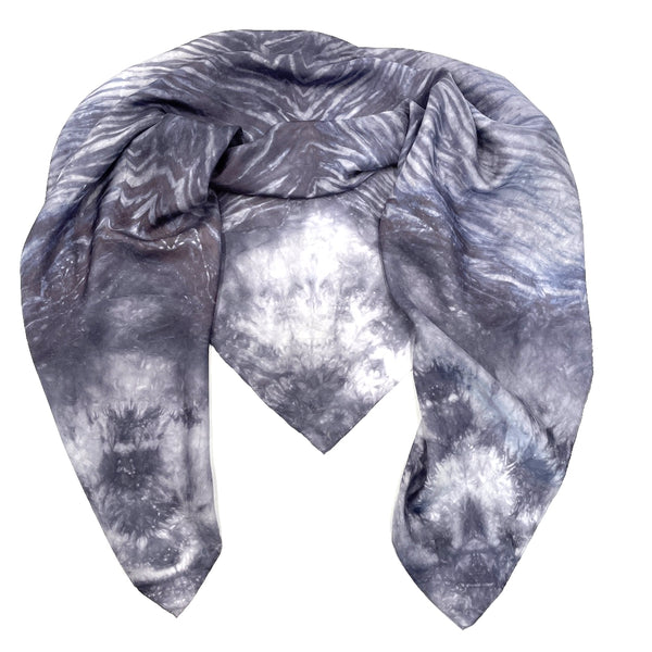 Slate grey, blue and white luxury silk scarf shawl in tie dye shibori pattern, sustainable wear with many style looks. Best fashion accessory for any season or occasion. Makes a great gift. Handmade one of a kind artisan accessories. Square shaped 43 inches by 43 inches.