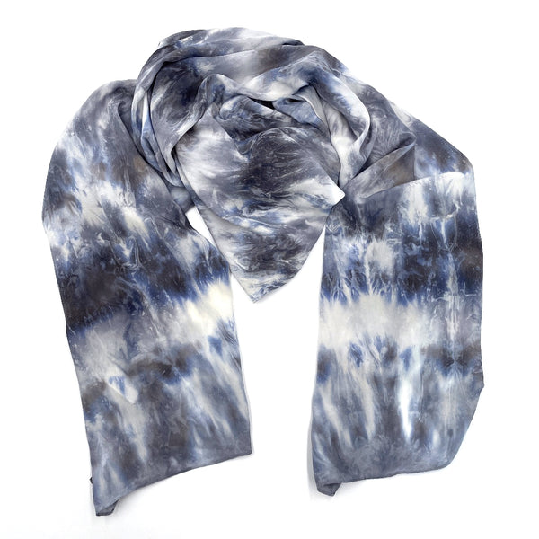 Slate grey, blue and white luxury silk scarf shawl in tie dye shibori pattern, sustainable wear with many style looks. Best fashion accessory for any season or occasion. Makes a great gift. Handmade one of a kind artisan accessories. Rectangle shaped 20 inches by 88 inches.