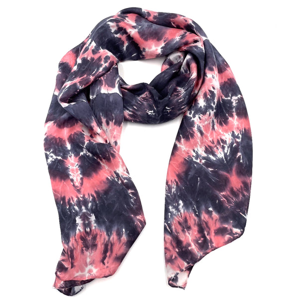 Beautiful luxury coral red, black and white silk scarf shawl in a tie dye shibori pattern, sustainable wear with many style looks. Best fashion accessory for any season or occasion. Makes a great gift. Handmade one of a kind artisan accessories. Rectangle shaped 22 inches by 88 inches.