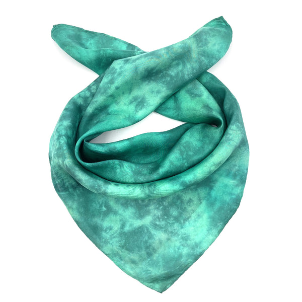 Emerald Green luxury silk bandana scarf in variegated tie dye shibori pattern, sustainable wear with many style looks. Best fashion accessory for any season or occasion. Makes a great gift. Handmade one of a kind artisan accessories.