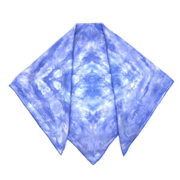 Periwinkle blue luxury silk bandana scarf in geometric shibori pattern, sustainable wear with many style looks. Best fashion accessory for any season or occasion. Makes a great gift. Handmade one of a kind artisan accessories. Square shaped 28 inches by 28 inches.