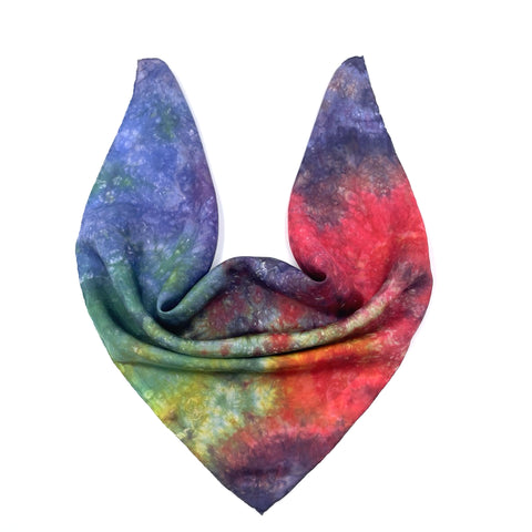 Rainbow multi colored luxury silk bandana scarf in random multi colored pattern resembling outer space. Sustainable wear with many style looks. Best fashion accessory for any season or occasion. Makes a great gift. Handmade one of a kind artisan accessories. Square shaped 21 inches by 21 inches.