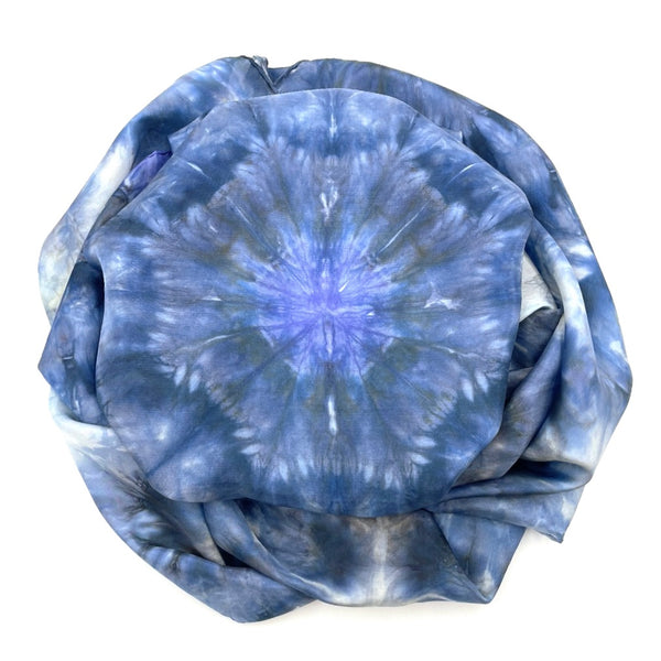Beautiful handmade 20”x88” hand dyed  100% SUSTAINABLE Rectangular Silk Scarf Shawl with hand rolled hem in various hues of blue, grey and white featuring a mosaic snowflake kaleidoscope design.