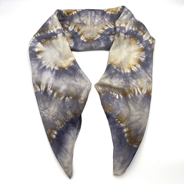 Gorgeous handmade shibori snowflake flower patterned square silk scarf measuring 43 inches by 43 inches in silver and gold hues. 