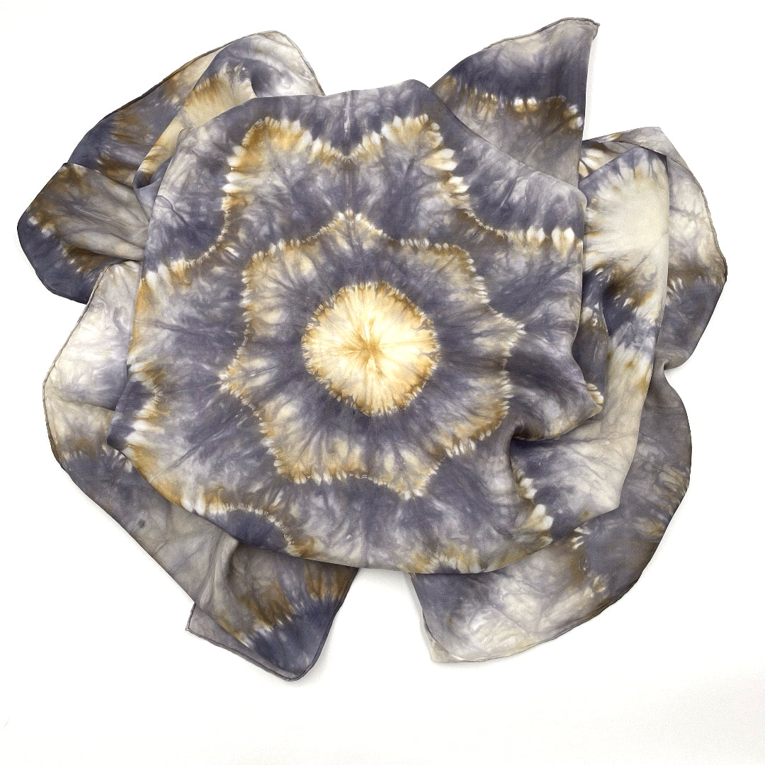 Gorgeous snowflake flower patterned square silk scarf measuring 43 inches by 43 inches in silver and gold hues. 