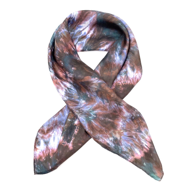 Red, green, blue and white luxury silk scarf bandana in tie dye shibori pattern, sustainable wear with many style looks. Best fashion accessory for any season or occasion. Makes a great gift. Handmade one of a kind artisan accessories. Square shaped 30 inches by 30 inches.