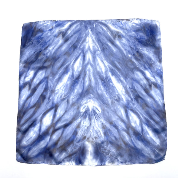 Indigo blue luxury silk pocket square scarf in striped shibori pattern, sustainable wear with many style looks. Best fashion accessory for any season or occasion. Makes a great gift. Handmade one of a kind artisan accessories. Square shaped 17 inches by 17 inches.