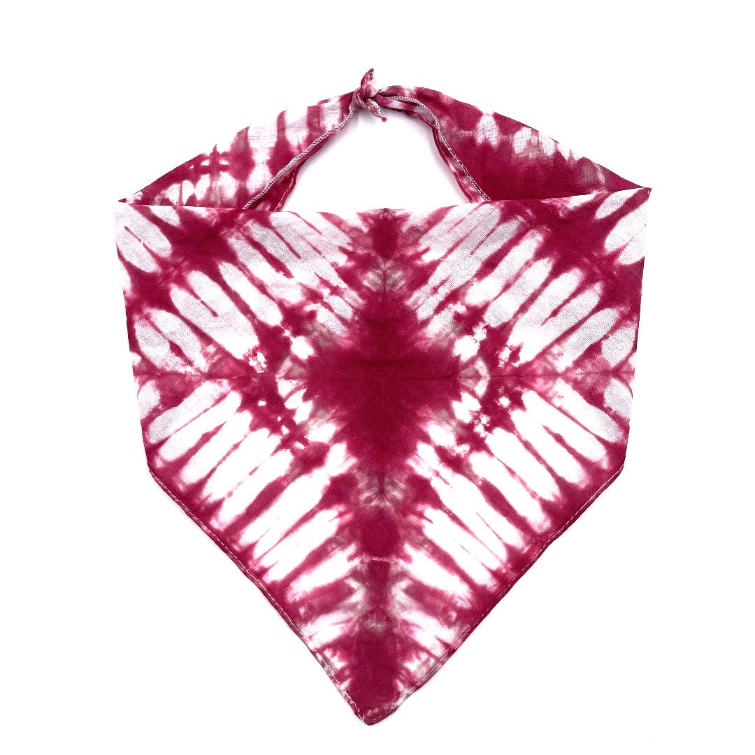 100% natural breathable triangular cotton bandana measuring 22"x22"x29" inches in a beautiful tie dyed shibori pattern in red and white.  Each bandana is custom made for your furry friend providing one-of-a-kind style.  No two are alike, and are not made by factory/machine! Lines are not perfect by intention and add to the character of the design. Machine washable and dryer friendly.