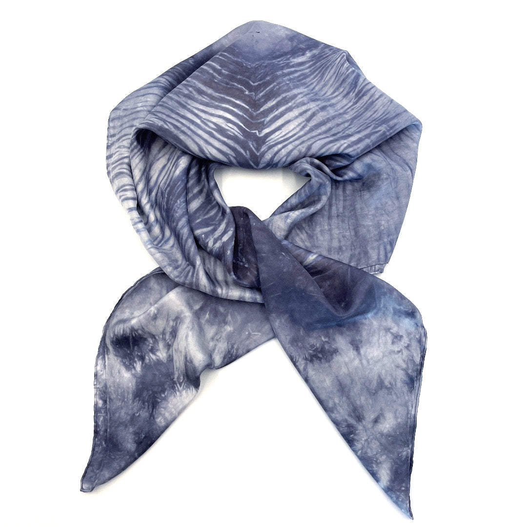 Slate grey, blue and white luxury silk scarf shawl in tie dye shibori pattern, sustainable wear with many style looks. Best fashion accessory for any season or occasion. Makes a great gift. Handmade one of a kind artisan accessories. Square shaped 43 inches by 43 inches.