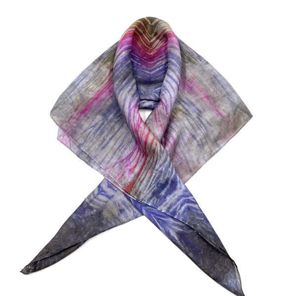 Rainbow multi colored large luxury silk square scarf in striped safari shibori pattern, sustainable wear with many style looks. Best fashion accessory for any season or occasion. Makes a great gift. Handmade one of a kind artisan accessories. Square shaped 43 inches by 43 inches.