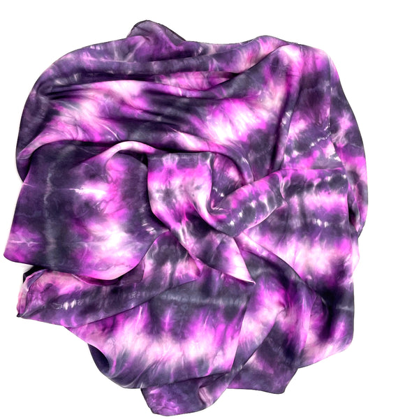 Pink fuchsia, black and white luxury silk large square scarf with tie dye shibori pattern, sustainable wear. Square dimension 43 inches by 43 inches. Best fashion accessory for any season or occasion, and makes a great gift. Handmade artisan one of a kind accessory.