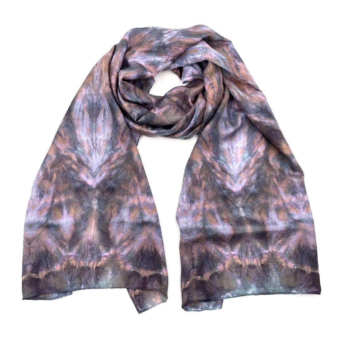 Beautiful multi-colored luxury silk scarf shawl featuring Natural summer colors in tie dye shibori pattern, sustainable wear with many style looks. Best fashion accessory for any season or occasion. Makes a great gift. Handmade one of a kind artisan accessories. Rectangle shaped 22 inches by 88 inches.