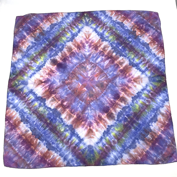 Red, Violet & Blue multi-colored luxury silk bandana scarf in a diamond shibori pattern, sustainable wear with many style looks. Best fashion accessory for any season or occasion. Makes a great gift. Handmade one of a kind artisan accessories. Square shaped 28 inches by 28 inches.