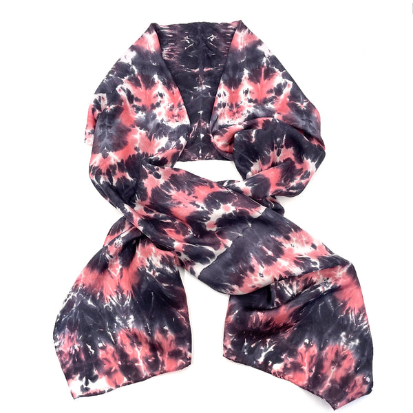 Beautiful luxury coral red, black and white silk scarf shawl in a tie dye shibori pattern, sustainable wear with many style looks. Best fashion accessory for any season or occasion. Makes a great gift. Handmade one of a kind artisan accessories. Rectangle shaped 22 inches by 88 inches.