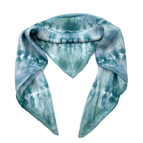 Mint Green luxury silk bandana scarf in circle tie dye shibori pattern, sustainable wear with many style looks. Best fashion accessory for any season or occasion. Makes a great gift. Handmade one of a kind artisan accessories. Square shaped 28 inches by 28 inches.